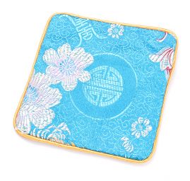 Elegantní brokátová taštička tyrkys ornament/květ