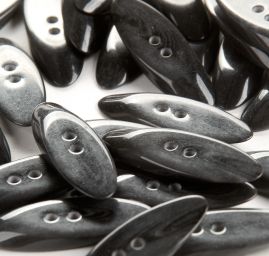 Knoflík plastový elipsa černošedá