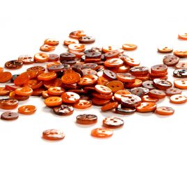 Knoflík perleťový dvoudírkový měděný