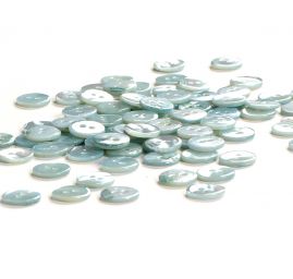 Knoflík perleťový dvoudírkový azurový 24"