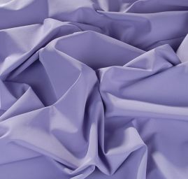 Pružná kostýmová látka levandulové barvy