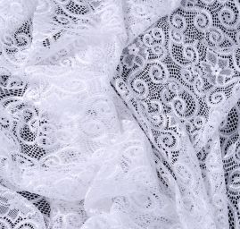 Pružná efektní krajka motiv ornamentů a květů bílá