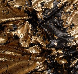 Pletenina s měnícími se flitry černé/zlaté barvy