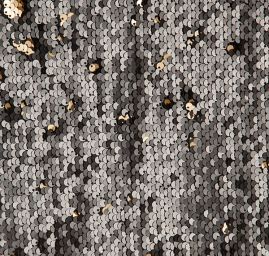 Pletenina s měnícími se flitry černé/zlaté barvy