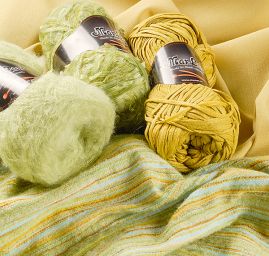 Kostýmová žakárová látka vlna směs pastel zelená