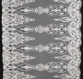 Krajka výšivka na tylu ornament slonová kost