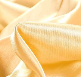 Satén pružný tm. zlatobéžový 