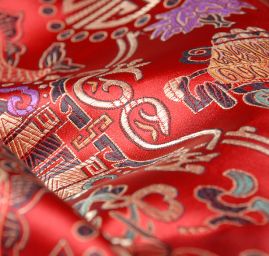 Látka brokát orientální motiv červený