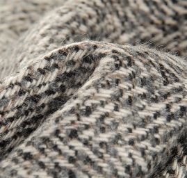 Kostýmová látka imitace ručně tkané metráže šedočerná