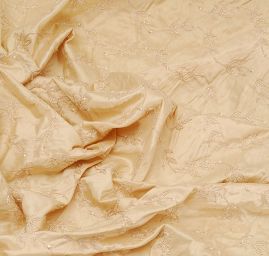 Vyšívaný šantung s rokajlem v krémové barvě