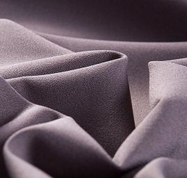 Kostýmová žoržetová látka šedohnědé barvy