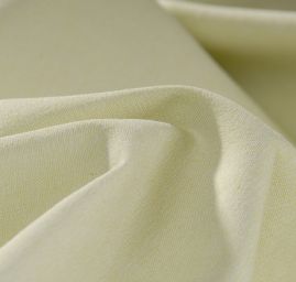 Bavlněná pružná látka světle zelená