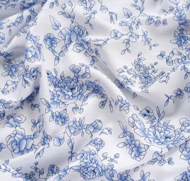 Viskozová šatová látka květy v modrobílé
