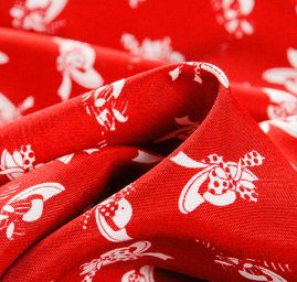 Látka na šaty motiv kloboučků červená