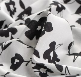Viskozová šatová látka vzor květů bílá/černá