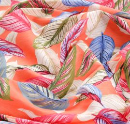 Viskozová šatová látka listy světle oranžová