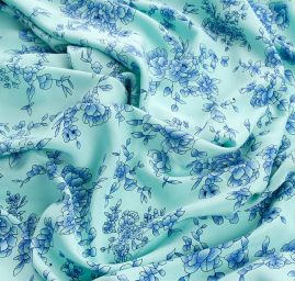 Viskozová šatová látka květy v mintmodrá