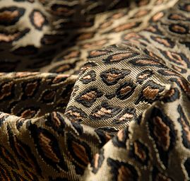 Lamé žakárová tkanina zvířecí motiv
