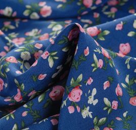 Viskozová šatová látka drobné kytičky modrá