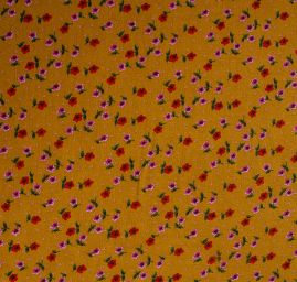 Viskozová šatová látka drobné květy okrová