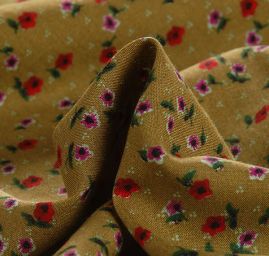 Viskozová šatová látka drobné květy zelená