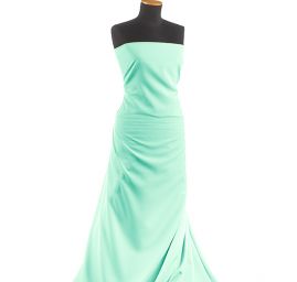 Kostýmová letní látka pastel pistáciová