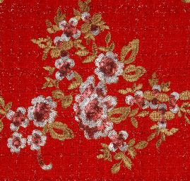 Kostýmová látka s flitrovou výšivkou květů