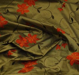 Vyšívaný šantug olivový s květy