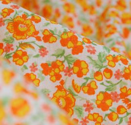 Bavlněná látka tisk kytičkový motiv oranžová