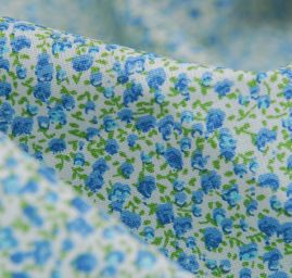 Bavlněná látka tisk drobné kytičky modrá