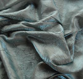 Lamé šatová látka kreš modrozelená