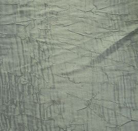 Lamé šatová látka zelenomodrá