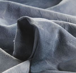 Viskozová šatová látka batika modrozelená