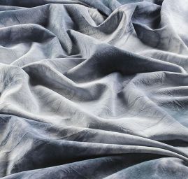 Viskozová šatová látka batika modrozelená