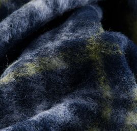 Efektní vlněná látka geometrický motiv zelená