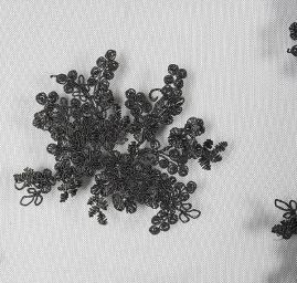 Krajka na hladkém tylu květy černé