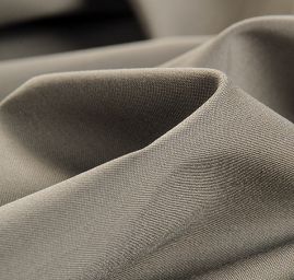 Pružná bavlněná látka zelenošedá