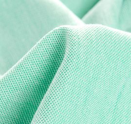 Retro úplet pleteniny tunel zelenobílý vzor