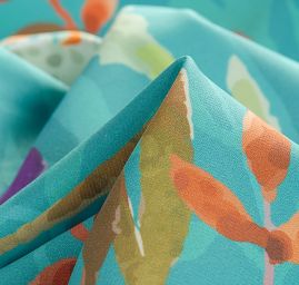 Žoržet šatový pružný bordura květy tyrkysový