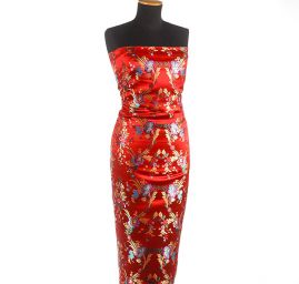 Brokát s folklórním motivem květů červený