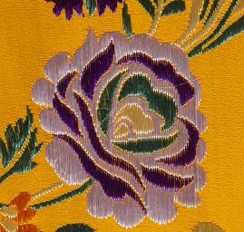 Brokát s folklŕním motivem květů okrově žlutý