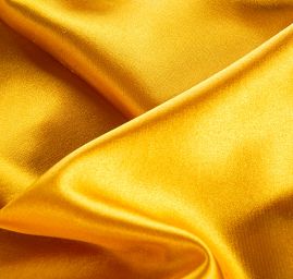 Pružný satén zlatožlutý