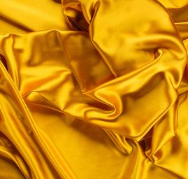 Pružný satén zlatožlutý