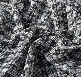 Látka na kostým imitace ručně tkané metráže černá/bílá