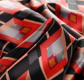 Satén pružný tisk art deco vzor červený