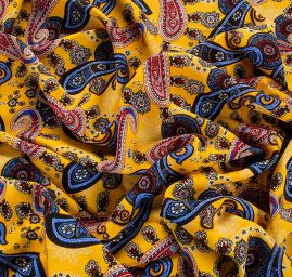 Viskozová šatová látka tisk paisley vzor modrožlutá