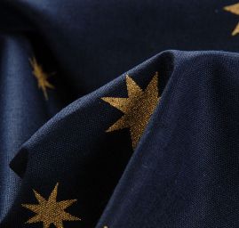 Bavlněná látka vánoční motiv hvězdiček zlatá/modrá