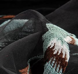 Krajka výšivka na tylu fénix pistácie