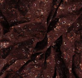 Efektní pružná krajka s nevšedním tiskem hnědá