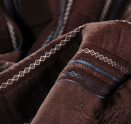 Žakárová pružná látka tmavší hnědá modrá